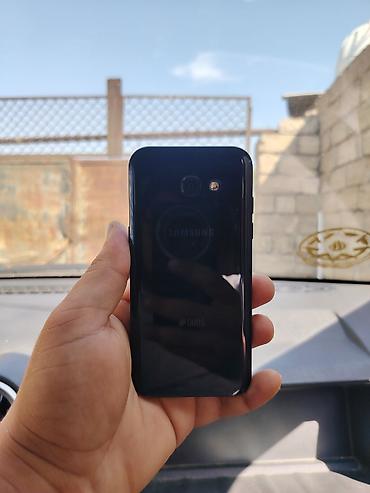 galaxy a71: Samsung Galaxy A3 2017, 32 GB, rəng - Qara, İki sim kartlı — 1
