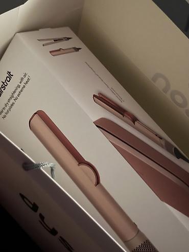 Расческа-выпрямитель Dyson