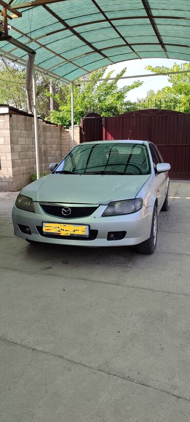 Mazda: Mazda 323: 2003 г., 1.6 л, Механика, Бензин, Седан