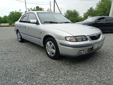 дамкрат авто: Mazda Capella: 1999 г., 2 л, Автомат, Бензин, Седан