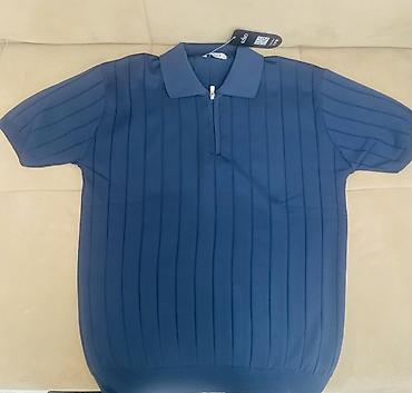 Kişi geyimləri: Kişi köynəyi – qısaqol polo model.S Ölçü,M ölçüyədə rahat uyğundur. - — 2