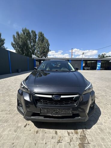 geely mk cross: Subaru XV – это компактный кроссовер серого цвета, подходящий для