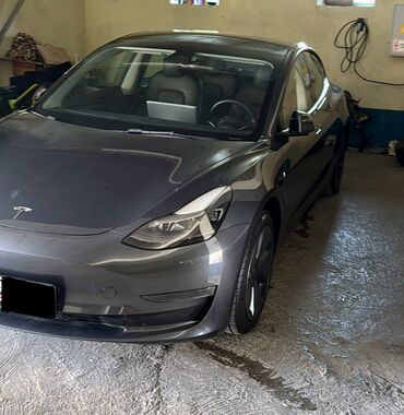 электро мобиль авто: Tesla Model 3 2022.11 standard range plus