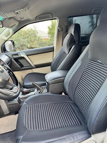 Toyota: Toyota Land Cruiser Prado – ağ rəngli, 5 qapılı SUV. Xüsusiyyətlər: - — 10