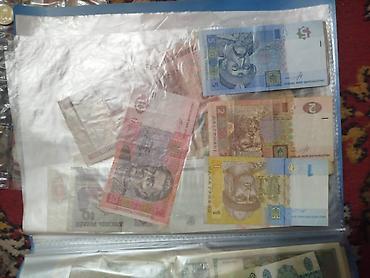 Монеты: Коллекция монет и банкнот России Состав: - Альбом «Памятные монеты — 20