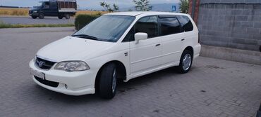 хонда одиссей сиденья: Белый минивэн Honda Odyssey. Модель оснащена литыми дисками