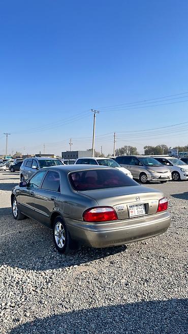 футляр для кия: Mazda Capella: 2001 г., 2 л, Автомат, Бензин, Седан — 5
