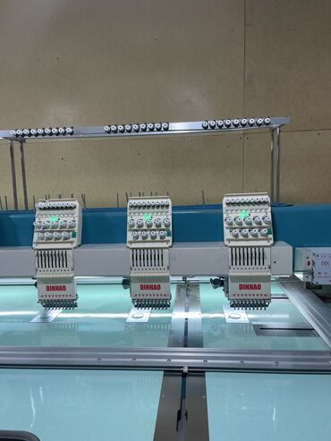 швейные станки: Вышивальный станок в наличии бар Фирма DINHAO Головка аралык 40см