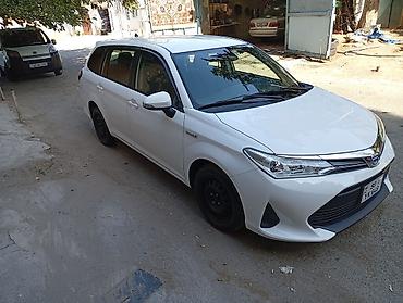 bort baqaj: Toyota Corolla Fielder Hybrid, ağ rəng, universaI kuzov. Texniki — 5