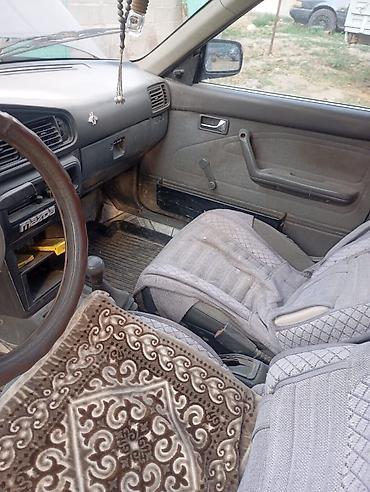газовыетарпеды на зил: Mazda 626: 1991 г. — 4