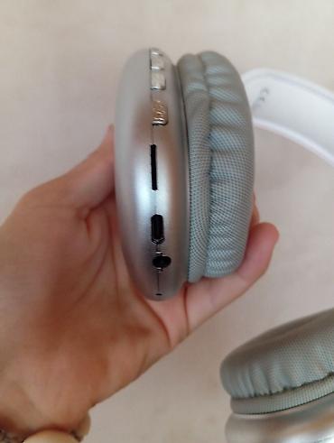 bluetooth qulaqliq: Bluetooth qulaqlıq – over-ear tipli, gümüşü kasa və ağ basliq 1-2 — 3