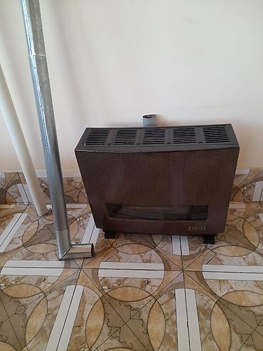 radiator: Adrian markalı qaz sobası (divara yaxın yerləşdirilən konvektor — 2