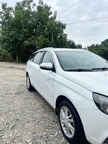 jac t8 ehtiyat hisseleri: Lada Vesta SW Cross, ağ rəng, universal kuzov. Texniki və dizayn — 1