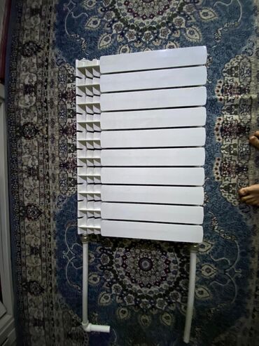 нагреватель для бассейна: Секционный радиатор отопления с подключением через боковые патрубки