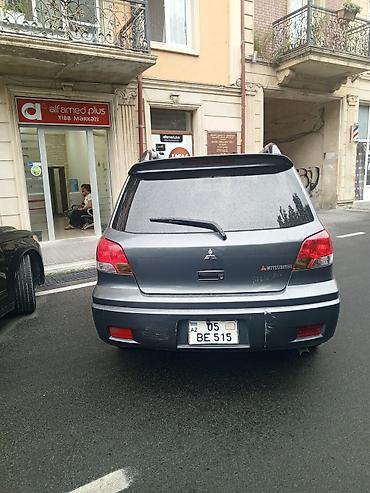 mercedesbenz masin: Mitsubishi Outlander, tünd boz rəng, 5 qapılı krossover/SUV. Əsas — 2