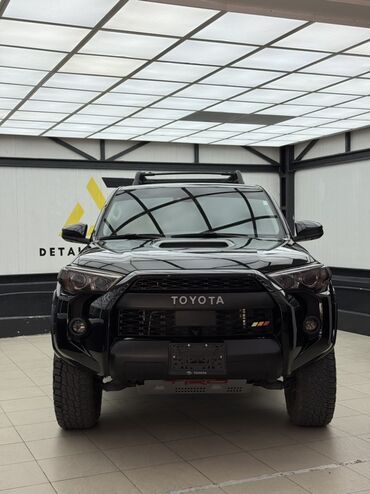 двигатель ниссан патфайндер 4.0 купить: Черный внедорожник Toyota 4Runner TRD Pro, оснащенный массивными