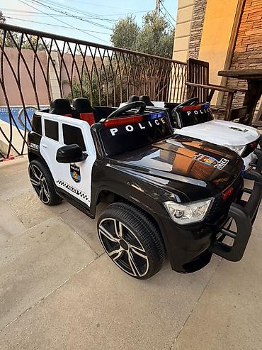 Uşaq dünyası: Uşaqlar üçün polis üslublu elektrikli mini avtomobil. Şəkillərdə — 2