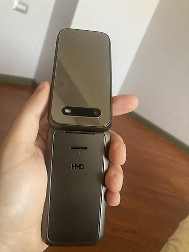 memory stick: HMD flip telefon Xüsusiyyətlər: - İki ekranlı dizayn: xarici saat/ — 4