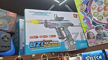 inkişaf etdirici oyuncaqlar: ● Bu, "Uzi Ice Horn" modeli olan elektrikli su tapançasıdır ● Tapança — 8