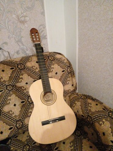 Musiqi alətləri: Klassik gitara, İşlənmiş, Ünvandan götürmə