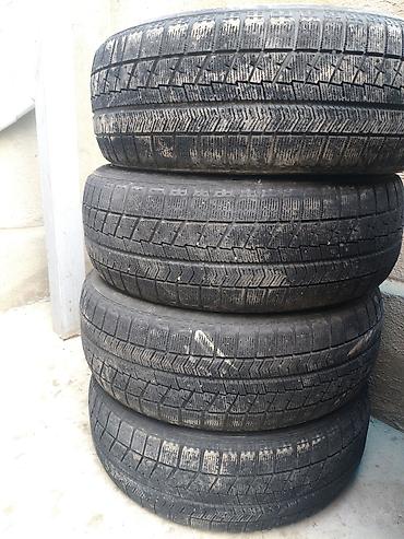 60: Бу зимние шины Bridgestone Blizzak VRX, комплект из 4 шт. - Размер — 2