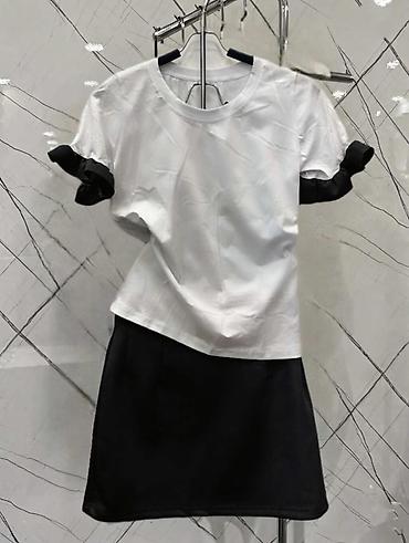 Kompleti: Damski komplet – kratka majica i mini suknja Opis: - Elegantni letnji — 10