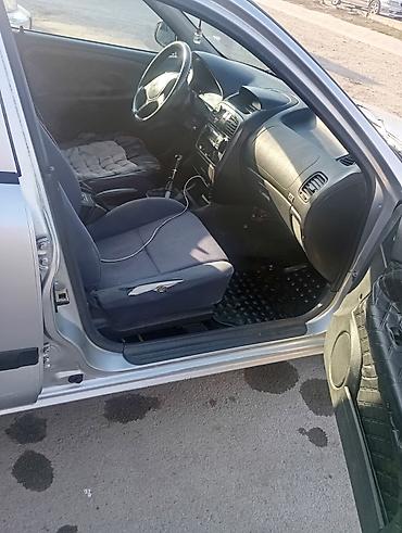Унаа сатуу: Mitsubishi Carisma: 2001 г., 0.6 л, Кол менен иштөөчү, Газ, Седан — 6