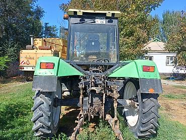 Другие тракторы: Колёсный трактор с кабиной Основные характеристики: - Полностью — 3