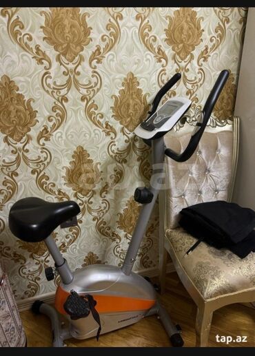 Velotrenajorlar: Məhsul: Ev üçün velotrenajor Təsvir: - Kompakt, şaquli tipli