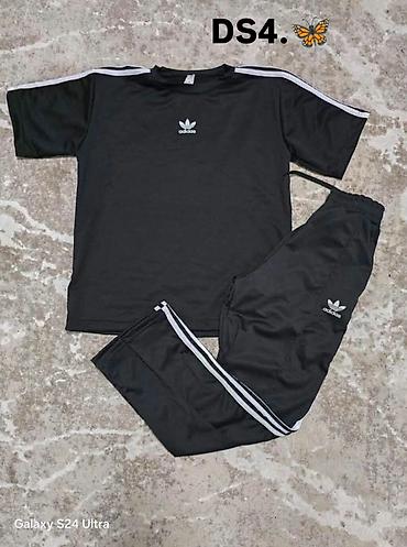zute pantalone: Dvodijelni sportski komplet (majica + trenerka) sa tri pruge i — 3