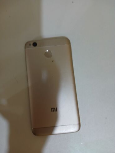 xiaomi telefonlari: Xiaomi Redmi 4X, 16 ГБ, цвет - Золотой, 
 Сенсорный, Отпечаток пальца, Две SIM карты