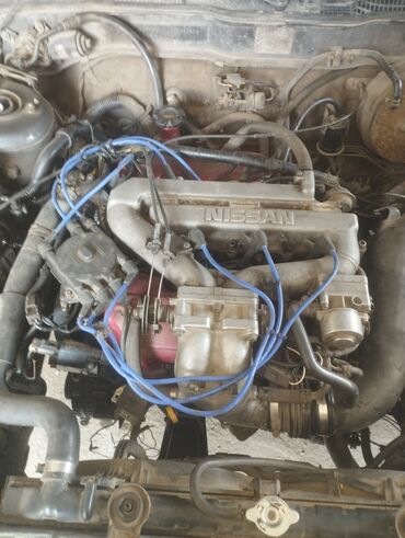 двигатель 2 2: Бензиновый мотор Nissan