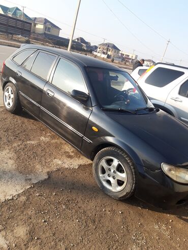 Mazda: Mazda 323: 2001 г., 1.6 л, Механика, Бензин, Универсал