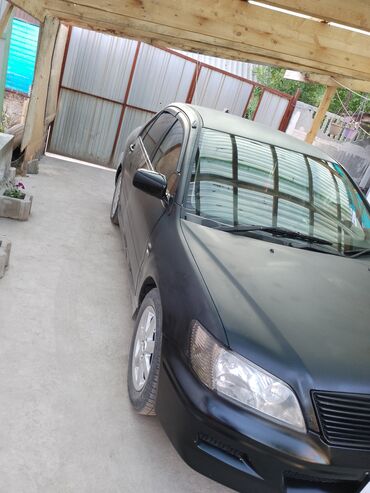 Mitsubishi: Mitsubishi Lancer: 2001 г., 1.5 л, Вариатор, Бензин, Седан