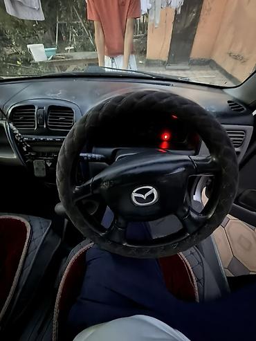 мисубиси спейс стар: Mazda Demio: 2001 г., 1.3 л, Автомат, Бензин, Хэтчбэк — 5