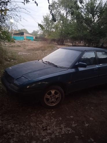 Mazda 323: 1992 г.