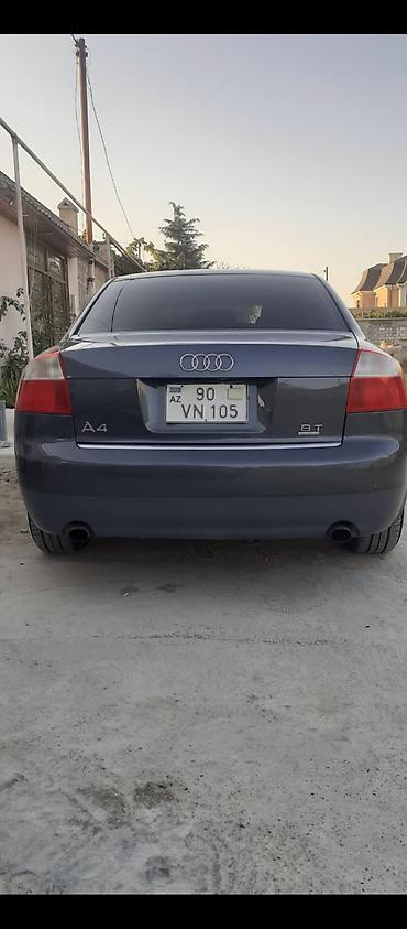 bmw e 38: Audi A4 sedan – tünd boz rəng, 4 qapı, 5 yerlik. B6 kuzov dizaynı — 5
