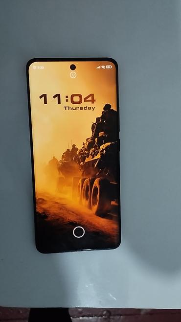 note 10 s: Arxa tərəfində "REDMI" brendi və "108MP" yazısı olan qara rəngli — 2