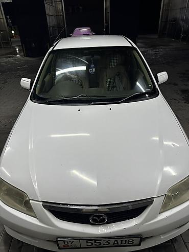 Продажа авто: Mazda Familia: 2002 г., Бензин, Седан — 2