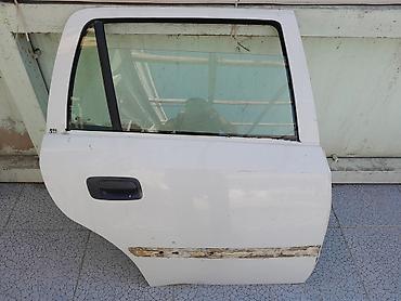 opel babin: Opel Astra G Arxa qapı üstündə iş gedib üzərində ruckasi və güzgüsü və — 2