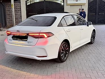 королла 120: Toyota Corolla: 2026 г., 1.8 л, Вариатор, Гибрид, Седан — 7