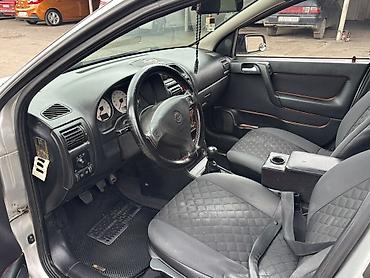 oka maşin: Opel Astra: 1.6 l | 1998 il 397 km Hetçbek — 6