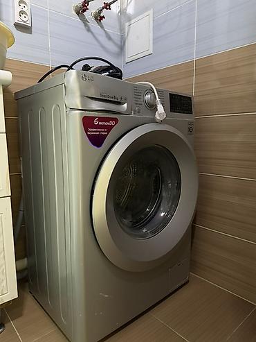 Стиральная машина LG с фронтальной загрузкой, серебристый корпус