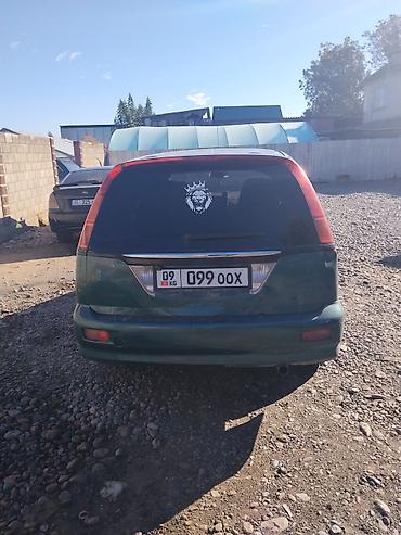 дом колесо: Honda Stream: 2001 г., 2 л, Автомат, Бензин, Минивэн — 6