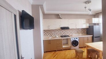 eksperimental binalar: Mənzilin təsviri: Razin ticarət mərkəzi binası sarı -96kv - Zövqlü
