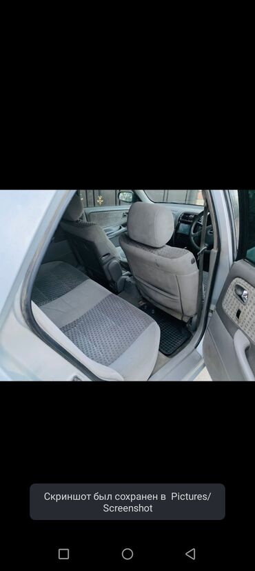 полированная машина: Mazda Capella: 2002 г., Седан