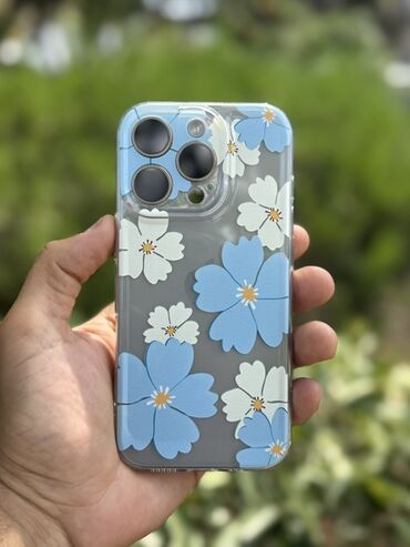 Kabrolar: Müxtəlif iPhone modelləri üçün çiçək naxışlı, şəffaf keys. Bu keys — 32