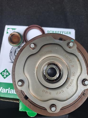 2 el kompresor: INA / Schaeffler variator (VVT dişlisi) komplekti. Şəkillərdə görünən — 1