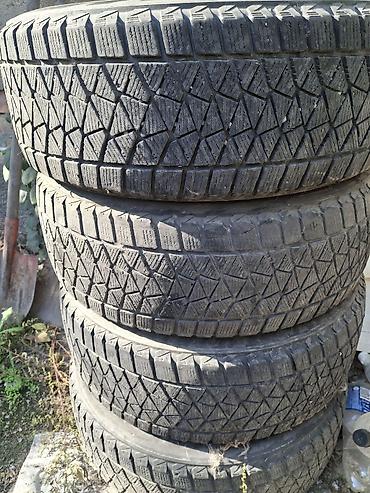шины 17 размера: Комплект зимних 4 шт. шин Bridgestone Blizzak DM-V2 - Размер: 225/60 — 1