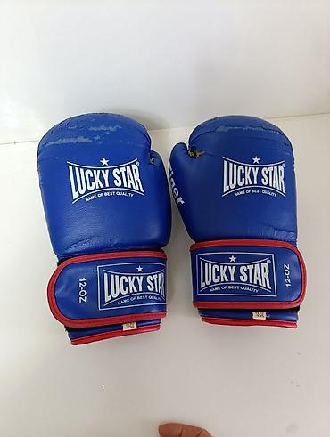 boks torbası: Məhsul: Lucky Star boks əlcəkləri - Çəki: 12 oz (hər əlcəkdə qeyd — 4